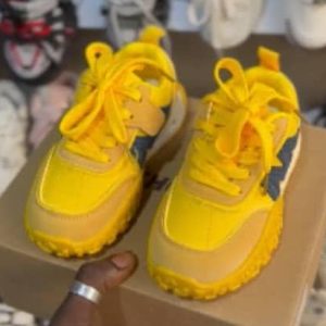 Yellow color canvas shoe