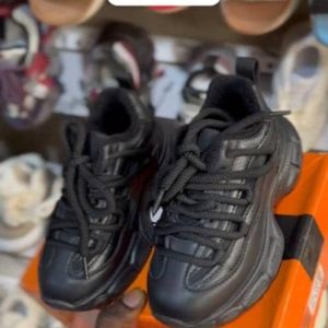 Black sneakers lace shoe