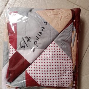 bedspread and 2 pillows