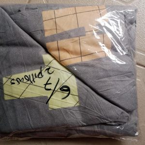 bedspread and 2 pillows