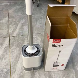 Toilet brush with drainer